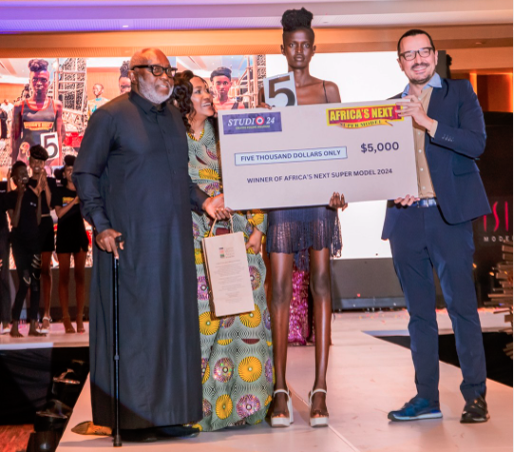 The-Winner-of- Africa-Next-Super-Model-2024-Chol-Tot-Nyang is from Kakuma Refugee Camp - South Sudan, Matteo PUGLISI Ceo of SELECT GLOBAL in presence of  Joan OKORODUDU, Ceo & Owner of ISIS MODEL, Chol-Tot-Nyang received a $5,000 check from Studio 24 Nigeria